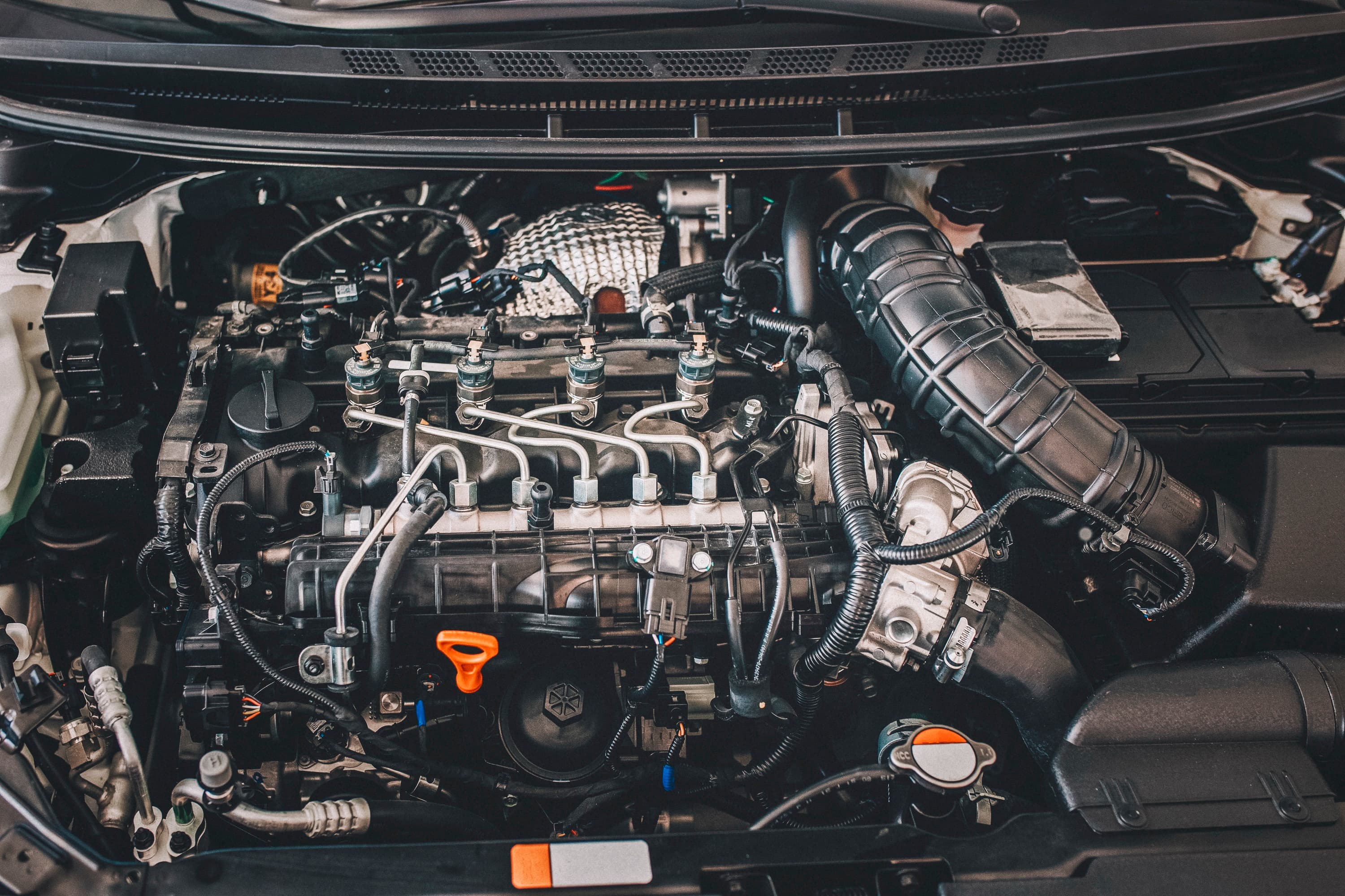 A clean, modern engine bay serviced by Handled